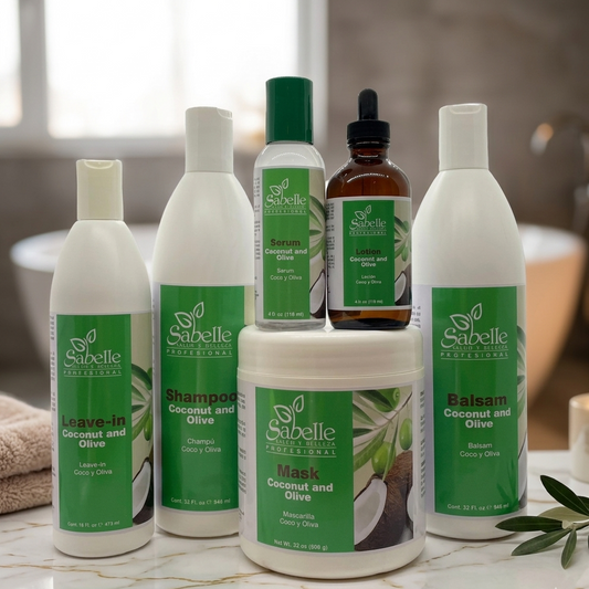 Collection of Sabelle hair care products on a marble surface with a blurred background